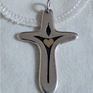 The James Avery retired Cross Pendant Light Of The World